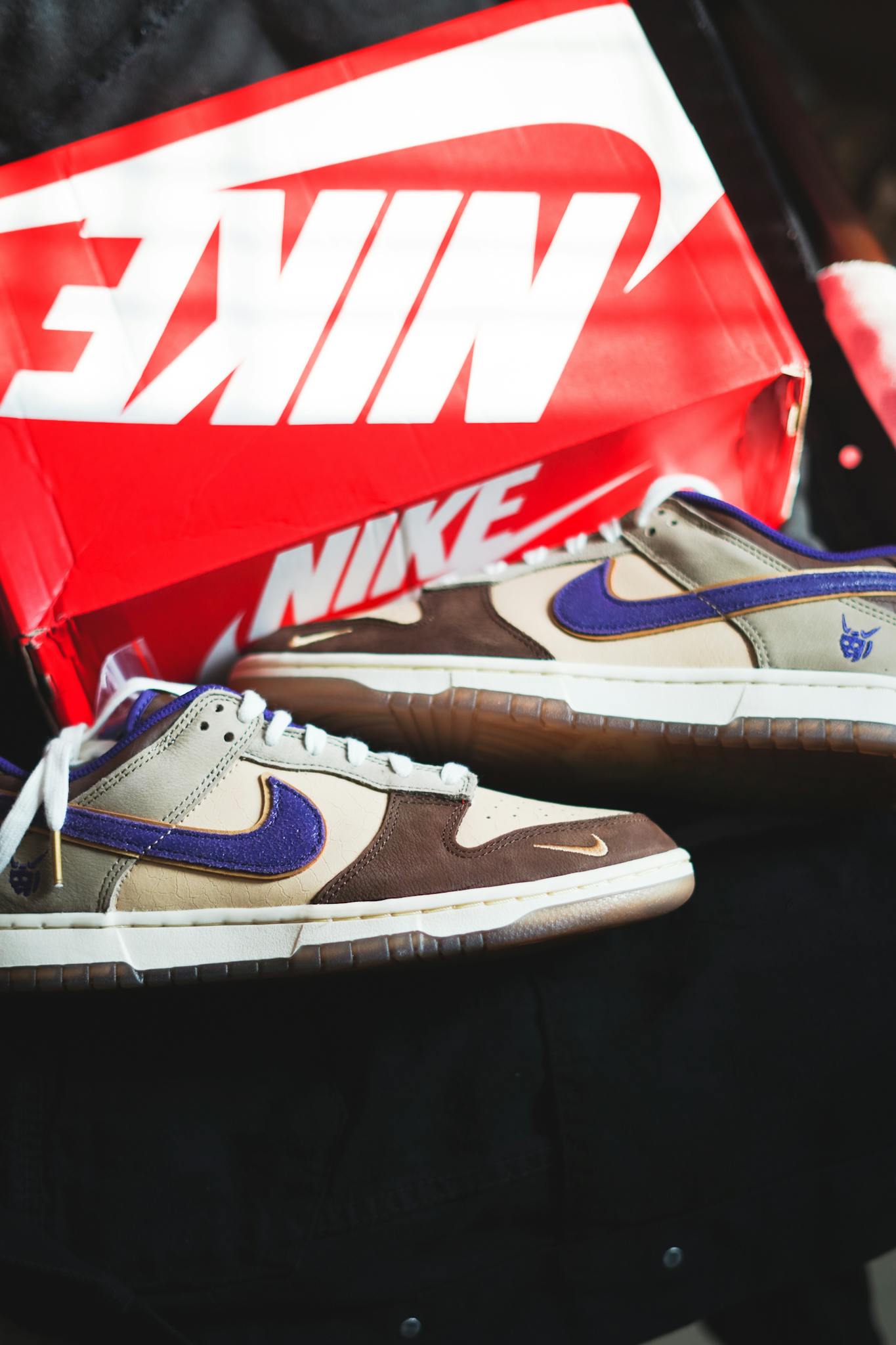 Stylish Nike Dunk Low Setsubun sneakers displayed with iconic red shoe box.